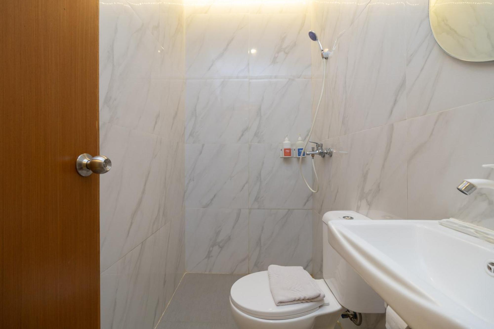 Sans Hotel Suryakencana Bogor Pokoj fotografie