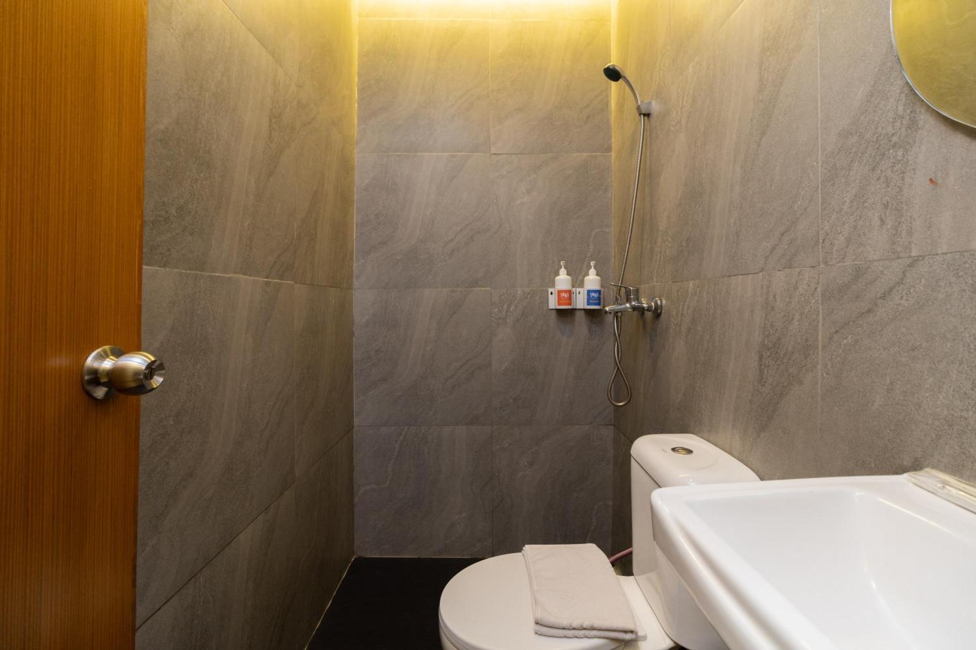 Sans Hotel Suryakencana Bogor Pokoj fotografie
